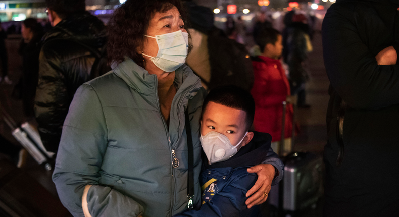 Chinese boy hugs relative amid coronavirus outbreak