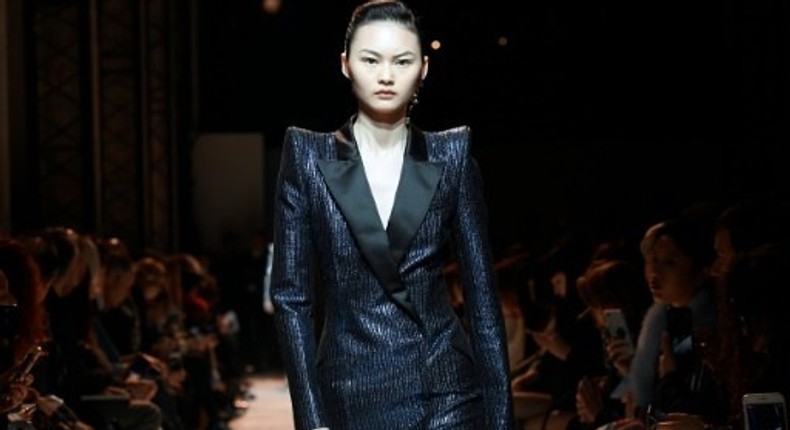 A model wearing one of Mugler's fearsome power suits