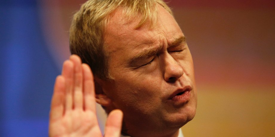 Liberal Democrat party leader Tim Farron gestures during a keynote speech on the final day of the party's conference in Bournemouth, 2015.