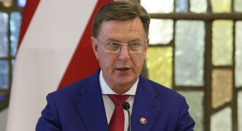 Latvian Prime Minister Maris Kucinskis, pictured August 2018, vowed to adhere to parliament's decision regarding the UN Global Compact for Migration, which his parliament has voted against