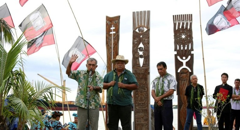 Former president of French Polynesia Oscar Temaru (L) speaks during a 2014 ceremony at a memorial dedicated to nuclear test victims in Papeete