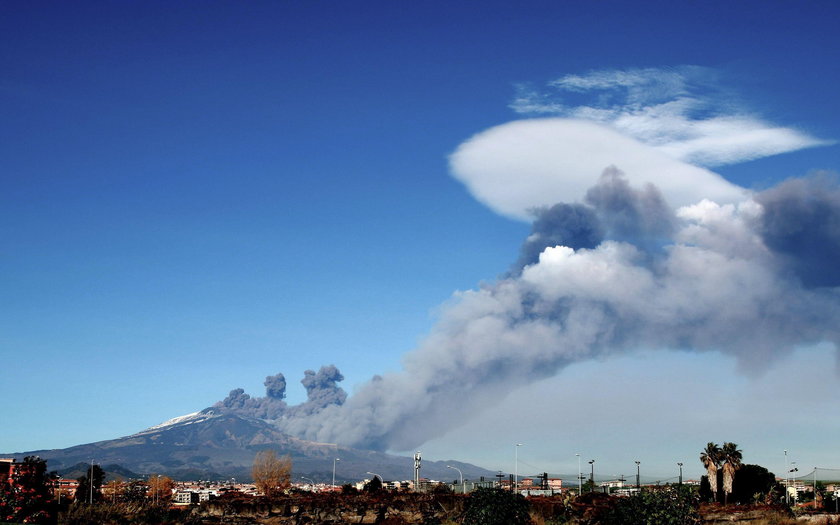 FILE PHOTO: Italy's Mount Etna, Europe's tallest and most active volcano, spews lava as it erupts on