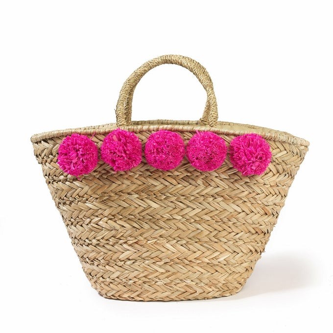Cabas avec pompons roses de La Redoute Collections pour environ CHF 30. 