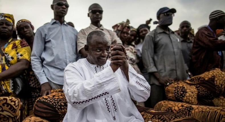 Gambian President-elect Adama Barrow greets supporters during a gathering on November 29, 2016