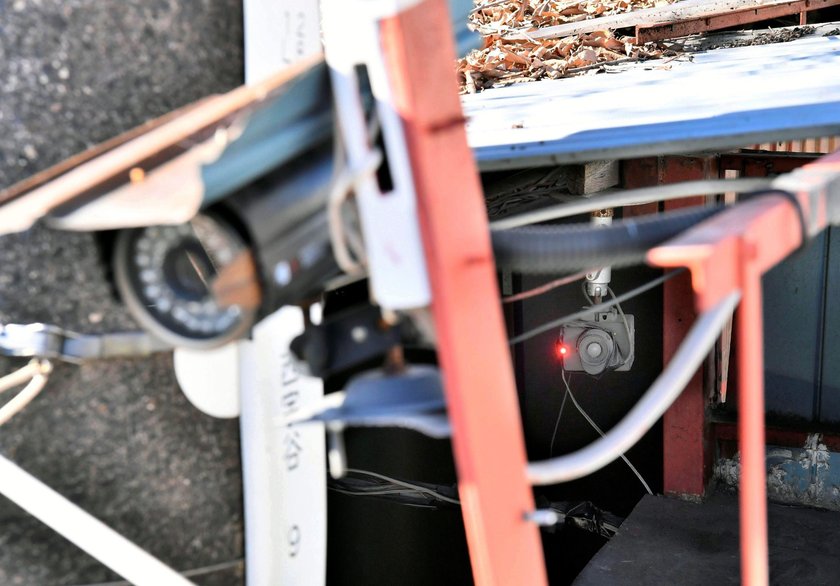 Monitoring cameras are seen at a house where the body of Kakimoto was found in Neyagawa