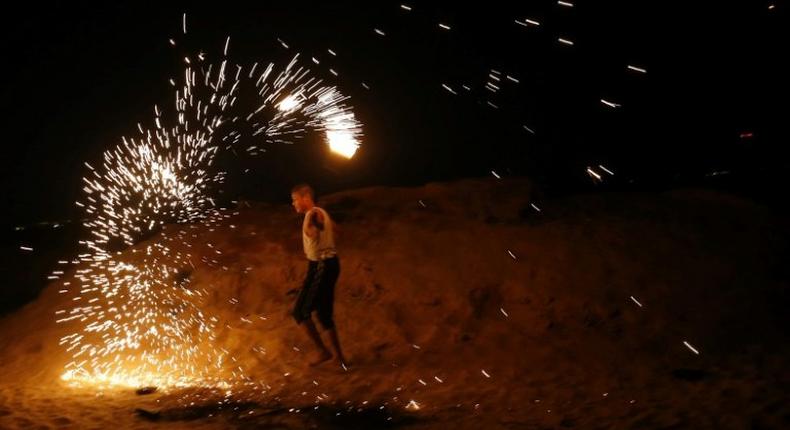 Organisers say the night protests aim to force the Jewish state to ease its crippling decade-long blockade of Gaza, but residents in nearby Israeli communities say their lives are being destroyed