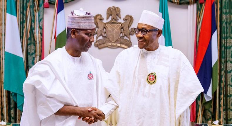 President Muhammadu Buhari (right) with Prof. Tijjani Muhammad-Bande (left) [Twitter/@BashirAhmaad]