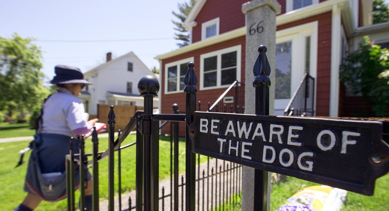 Postal workers suffer more than 5,400 dog attacks every year.Ben McCanna/Portland Portland Press Herald via Getty Images