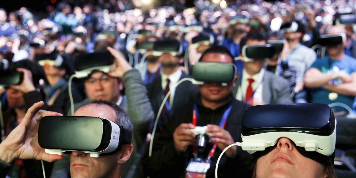 People wear Samsung Gear VR devices as they attend the launching ceremony of the new Samsung S7 and S7 edge smartphones during the Mobile World Congress in Barcelona, Spain, February 21, 2016.