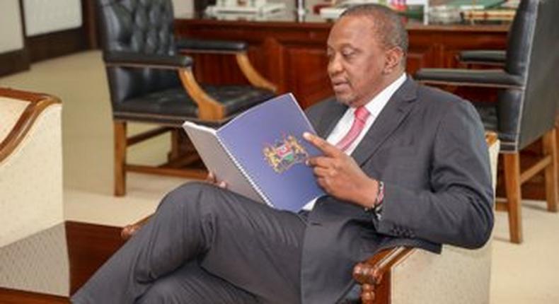 President Uhuru Kenyatta reading BBI report
