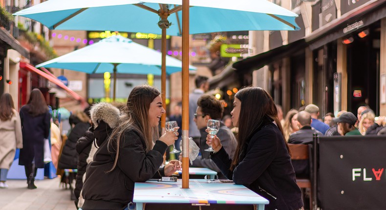 People in England flock back to pubs and restaurants as lockdown restrictions were eased on April 12, 2021.
