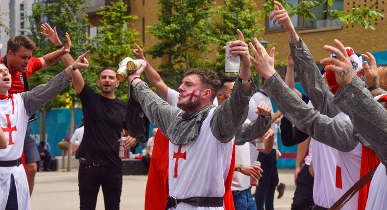 England football fans wearing knight costumes sing outside Wembley Stadium ahead of the England v Italy Euro 2020 final.Vuk Valcic/SOPA Images/LightRocket via Getty Images