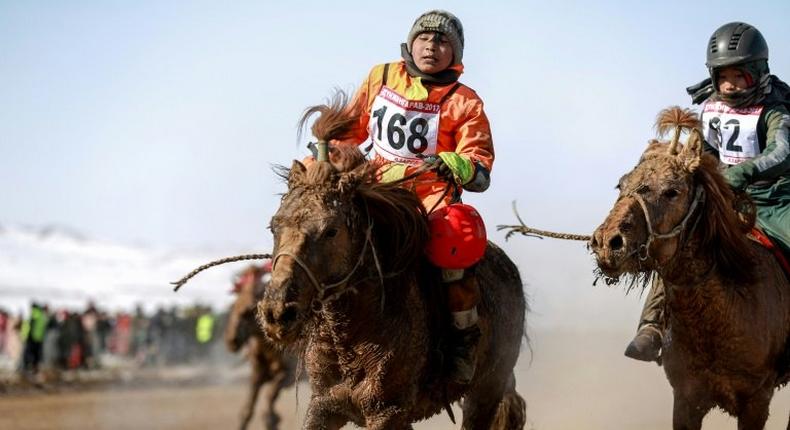 In Mongolia court bans and criticism from human rights groups are ignored as the practice of using child jockeys in horse races persists