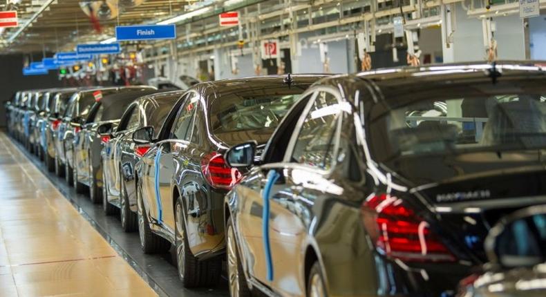 Germany's economy went into reverse in the third quarter, with the auto sector badly hit by new emissions regulations