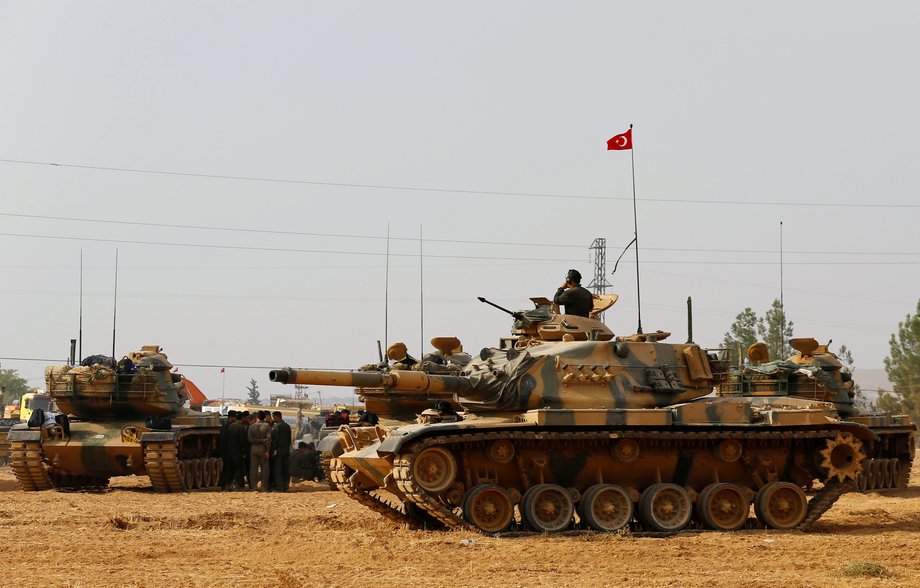 Turkish army tanks and military personal are stationed in Karkamis on the Turkish-Syrian border in the southeastern Gaziantep province, Turkey, August 25, 2016