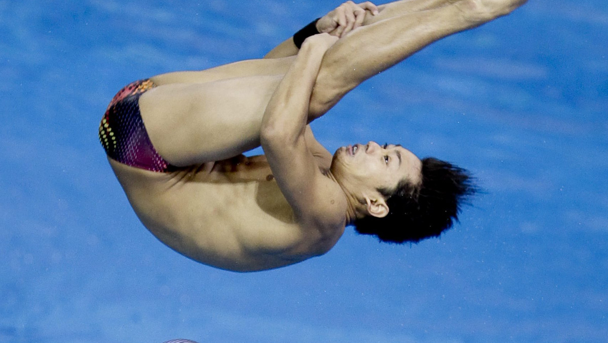 Chińczycy Yuan Cao i Yanquan Zhang triumfowali w konkursie synchronicznych skoków do wody mężczyzn z 10-metrowej wieży. To już siódmy złoty medal wywalczony przez Chiny w Londynie.