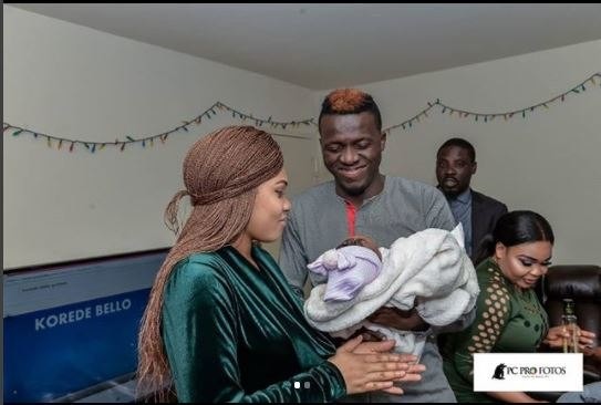 Akpororo and wife all smiles with one of the twins 