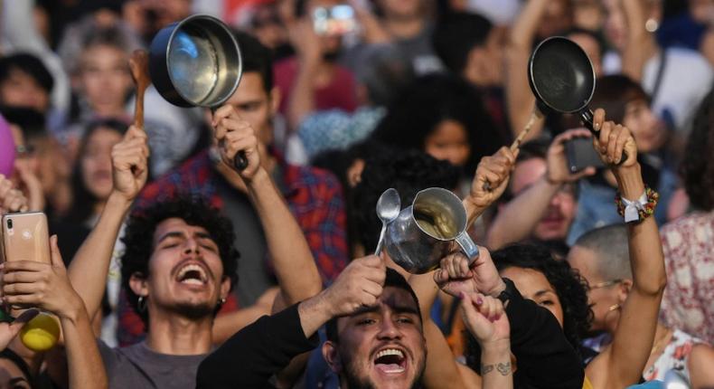 People bang pans and pots at a concert in support of the strike against President Ivan Duque's government in Medellin, Colombia on December 1, 2019