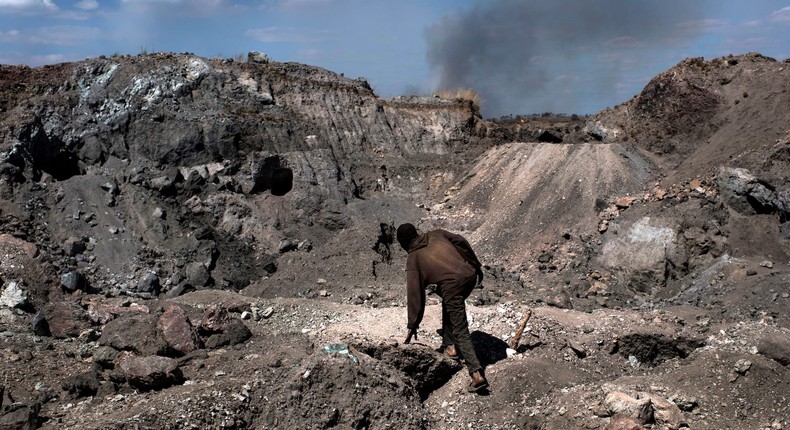 In the Democratic Republic of Congo, deep craters are dug into the earth to mine cobalt, a natural resource required to make lithium batteries.