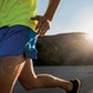 France, Crozon peninsula, young man running on the beach