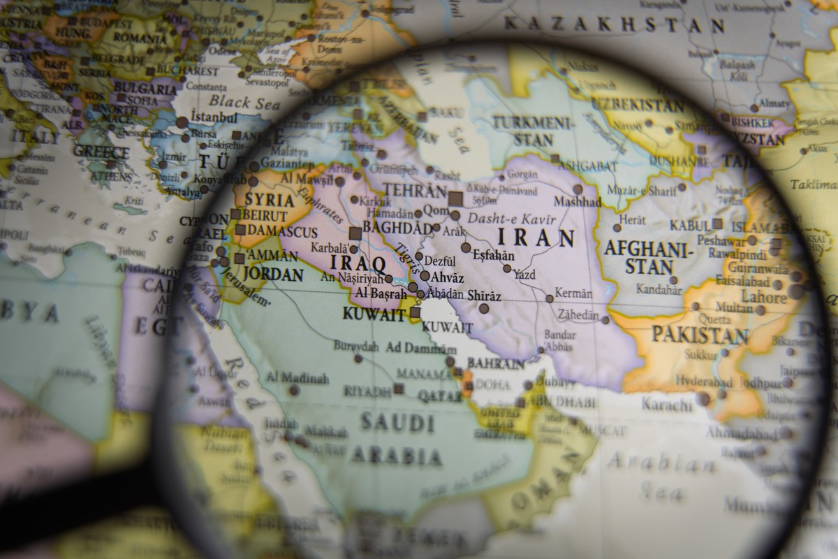 Magnifying,Glass,Over,A,Geographical,Map,Of,The,Middle,East