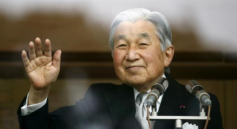 Japan's Emperor Akihito waves to well-wishers who gathered at the Imperial Palace to mark his 82nd birthday in Tokyo, Japan, December 23, 2015. 