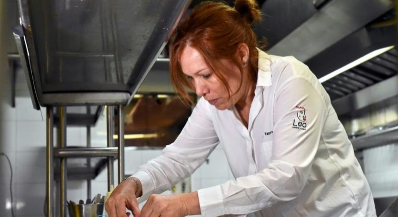 Colombian chef Leonor Espinosa prepares a dish at her restaurant LEO in Bogota