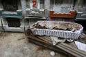 A skeleton is seen in its coffin during exhumation work at the General Cemetery in Guatemala City