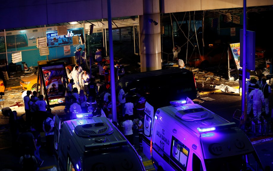 Forensic experts work outside Turkey's largest airport, Istanbul Ataturk, after a blast on June 28.