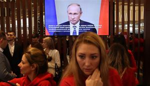 Russian President Vladimir Putin seen on the screen during the meeting of his supporters on December 16, 2023 in Moscow, Russia.Getty Images