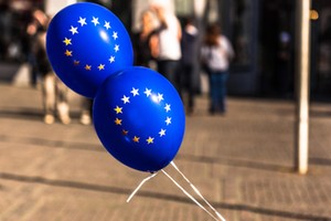 Close-Up Of Blue Balloons On Street