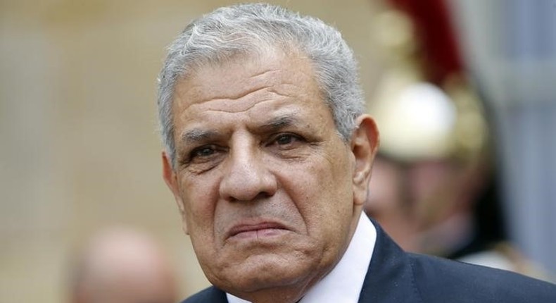 Egyptian Prime Minister Ibrahim Mehleb leaves after a meeting at the Hotel Matignon in Paris, France, May 13, 2015.   REUTERS/Charles Platiau