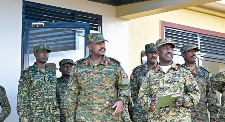 CDF Gen Muhoozi Kainerugaba with Brig. Asaph Mweteise (R) at Camp Rufu in Kiruhura district