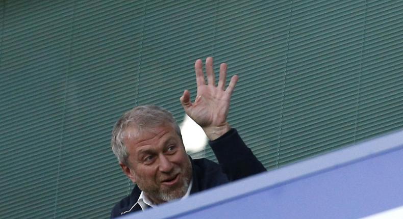 Roman Abramovich rose from a penniless background in Russia's frozen north to become a multi-billionaire and a celebrity football tycoon, but his empire is teetering over his alleged Kremlin links. Creator: Ian KINGTON