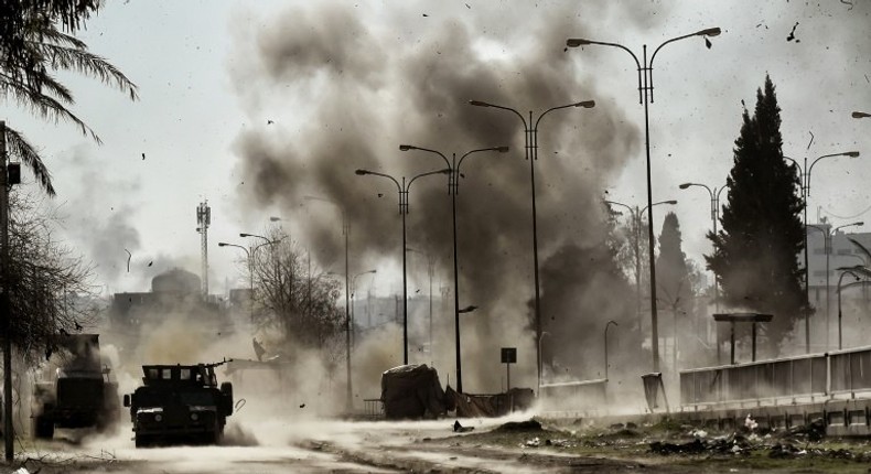 Smoke billows following a car bomb explosion as Iraqi forces clash with Islamic State (IS) group fighters in Mosul, northern Iraq on March 5, 2017, during an offensive to retake the western parts of the city from the jihadists