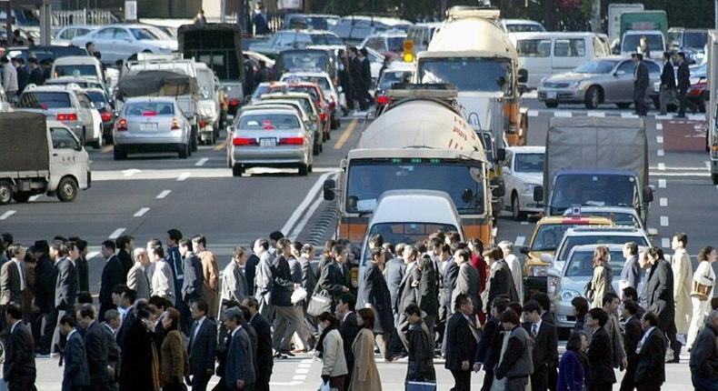 Japan's government says it will push further for measures against work-related suicides, saying that cutting extreme work hours and preventing harassment by bosses are necessary