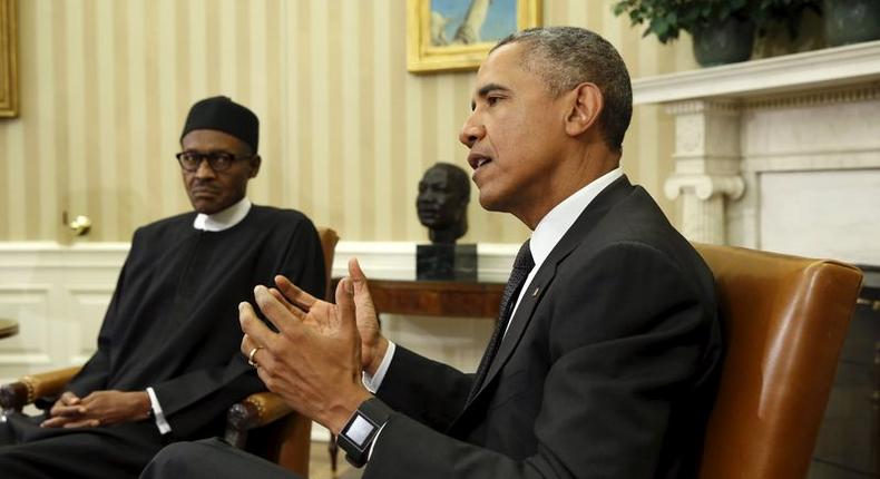 U.S. President Barack Obama meets with Nigerian President Muhammadu Buhari (L) in the Oval Office of the White House in Washington July 20, 2015. REUTERS/Kevin Lamarque