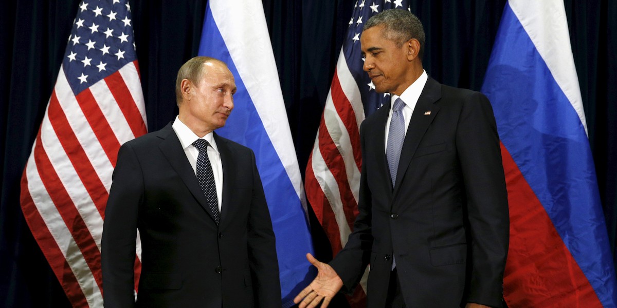 U.S. President Barack Obama extends his hand to Russian President Vladimir Putin during their meeting at the United Nations General Assembly in New York September 28, 2015.