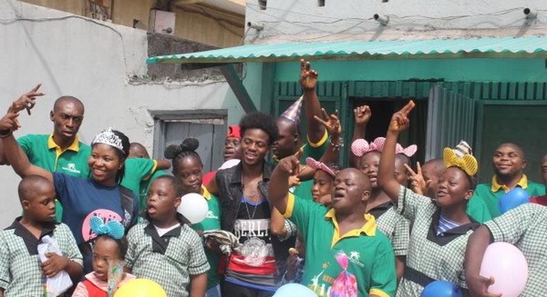 Korede Bello celebrates with Down Syndrome kids