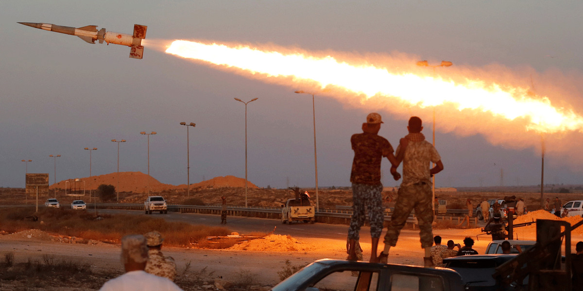 Fighters of Libyan forces allied with the UN-backed government firing at Islamic State fighters in Sirte, Libya.