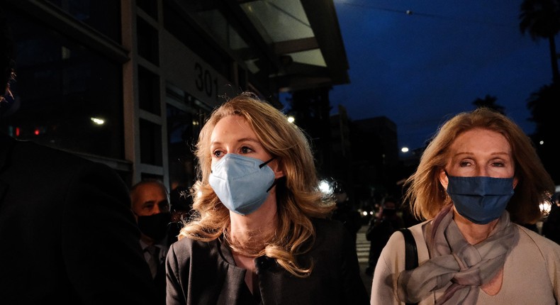 Theranos founder and former CEO Elizabeth Holmes (left) leaves court on Monday.