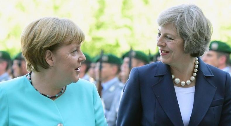 German Chancellor Angela Merkel (L) and British Prime Minister Theresa May meet in Berlin on July 20, 2016 