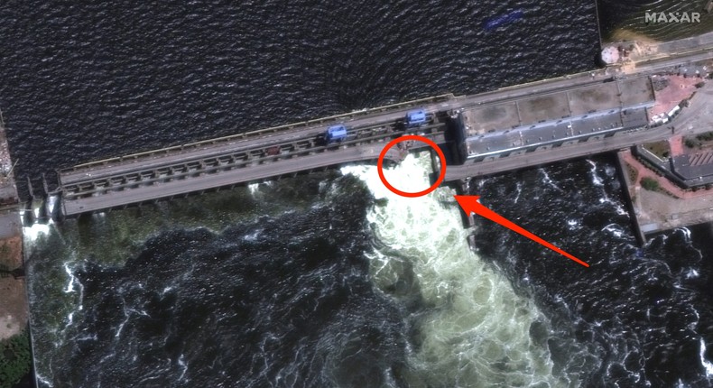 An image taken on June 5, before the dam was breached, shows damage to the roadway.Maxar Technologies/Handout via Reuters