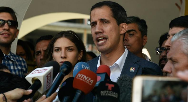 Juan Guaido, Venezuela's National Assembly leader and self-proclaimed acting president, is in a test of wills with President Nicolas Maduro