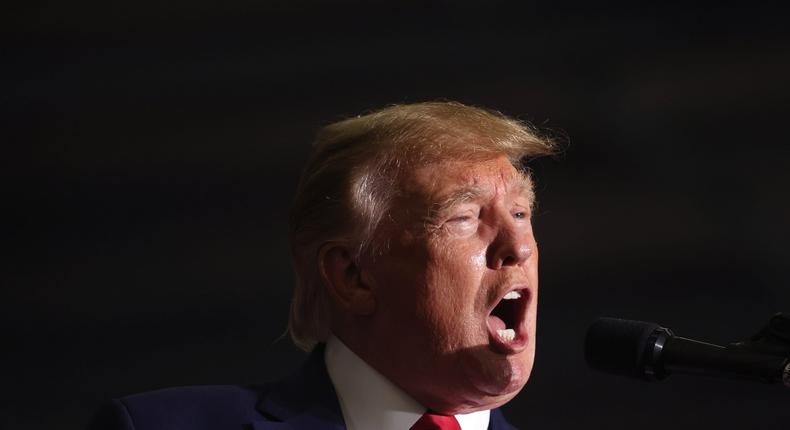 Former President Donald Trump speaks to supporters at a rally on April 2, 2022, near Washington, Michigan.