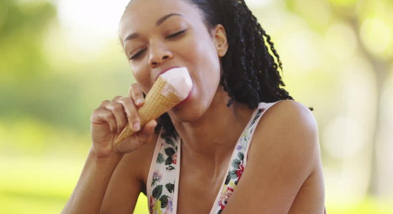 Woman enjoying ice-cream (Shutterstock)