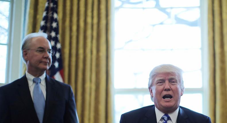 President Trump reacts to the AHCA health care bill being pulled by Congressional Republicans before a vote as he appears with Secretary of Health and Human Services Tom Price (L) and Vice President Mike Pence (R) in the Oval Office of the White House in Washington, U.S., March 24, 2017.