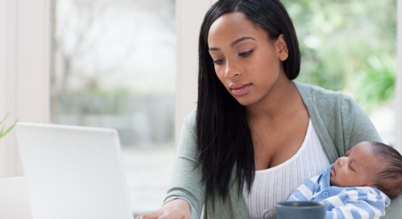 A mother working from home