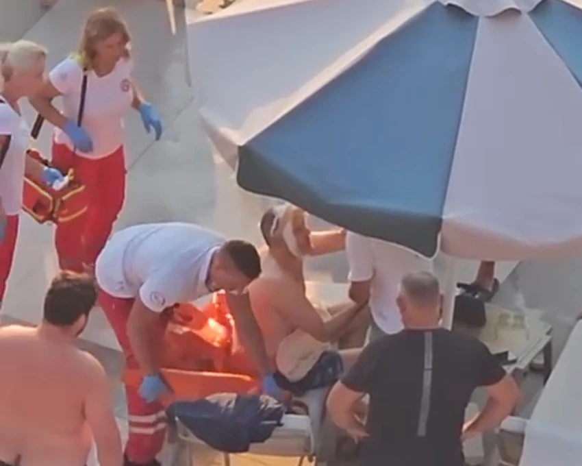 Ekipa Hitne pomoći previja rane Marku Ljubiši Kanu 