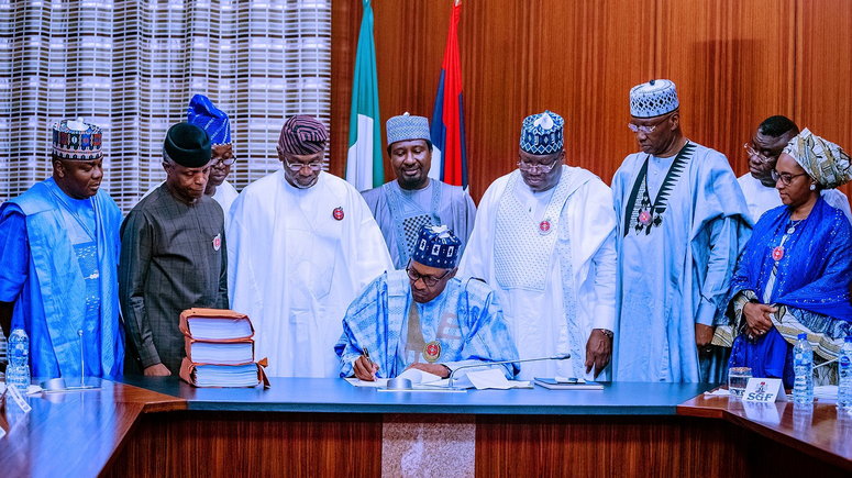 Image result for buhari sign budget